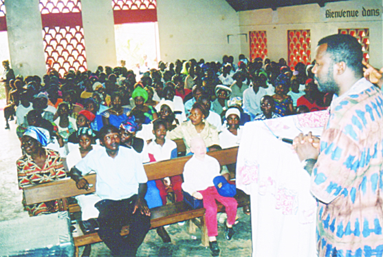 Ernest preaching at a crusade about 2001